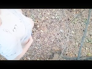 Caught masturbating in a wood with her big tits